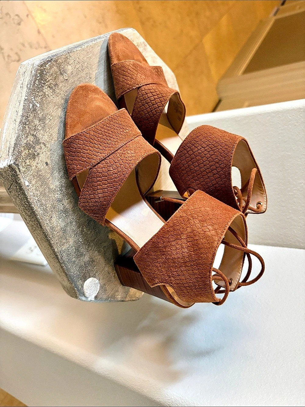 Franco Sarto block-heel sandals, chestnut suede finish with ankle-wrap laces.